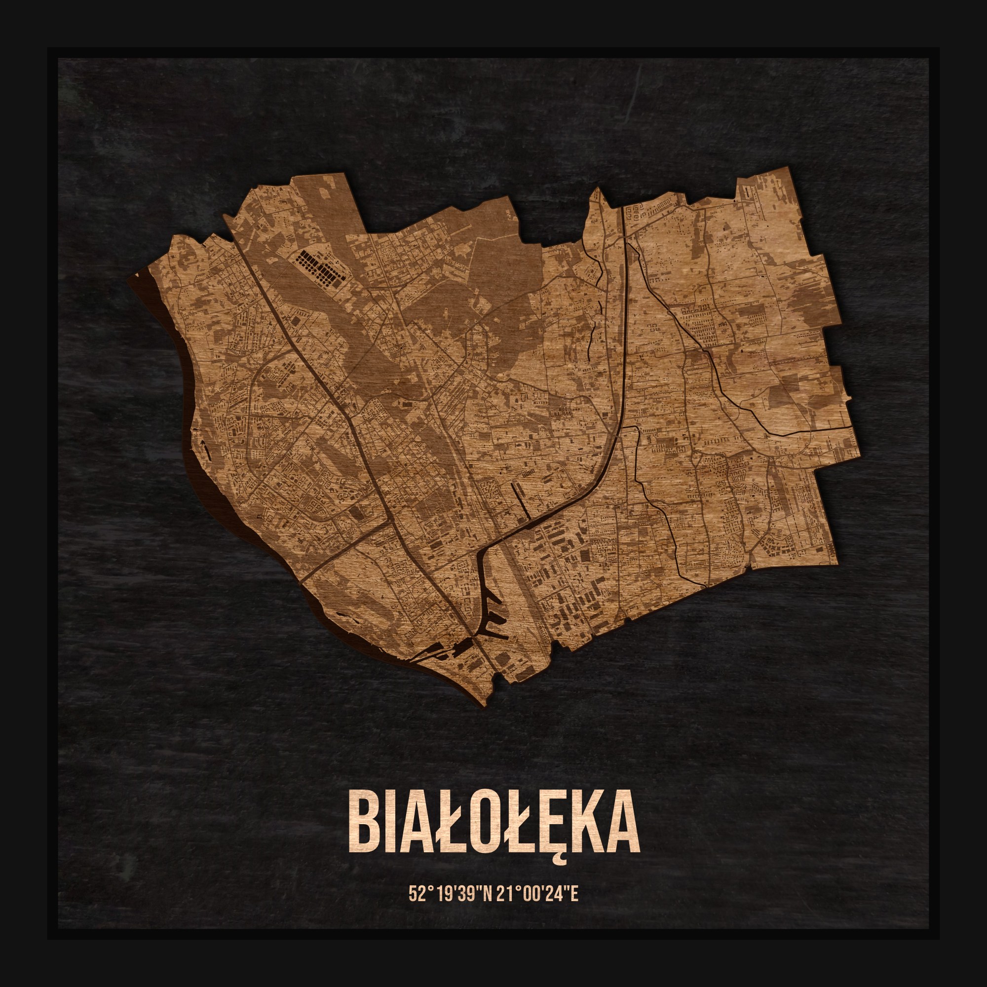 Drewniana mapa dzielnicy Białołęka w ramce 25×25: kontur dzielnicy na czarnej płycie, ulice, budynki, zieleń i woda