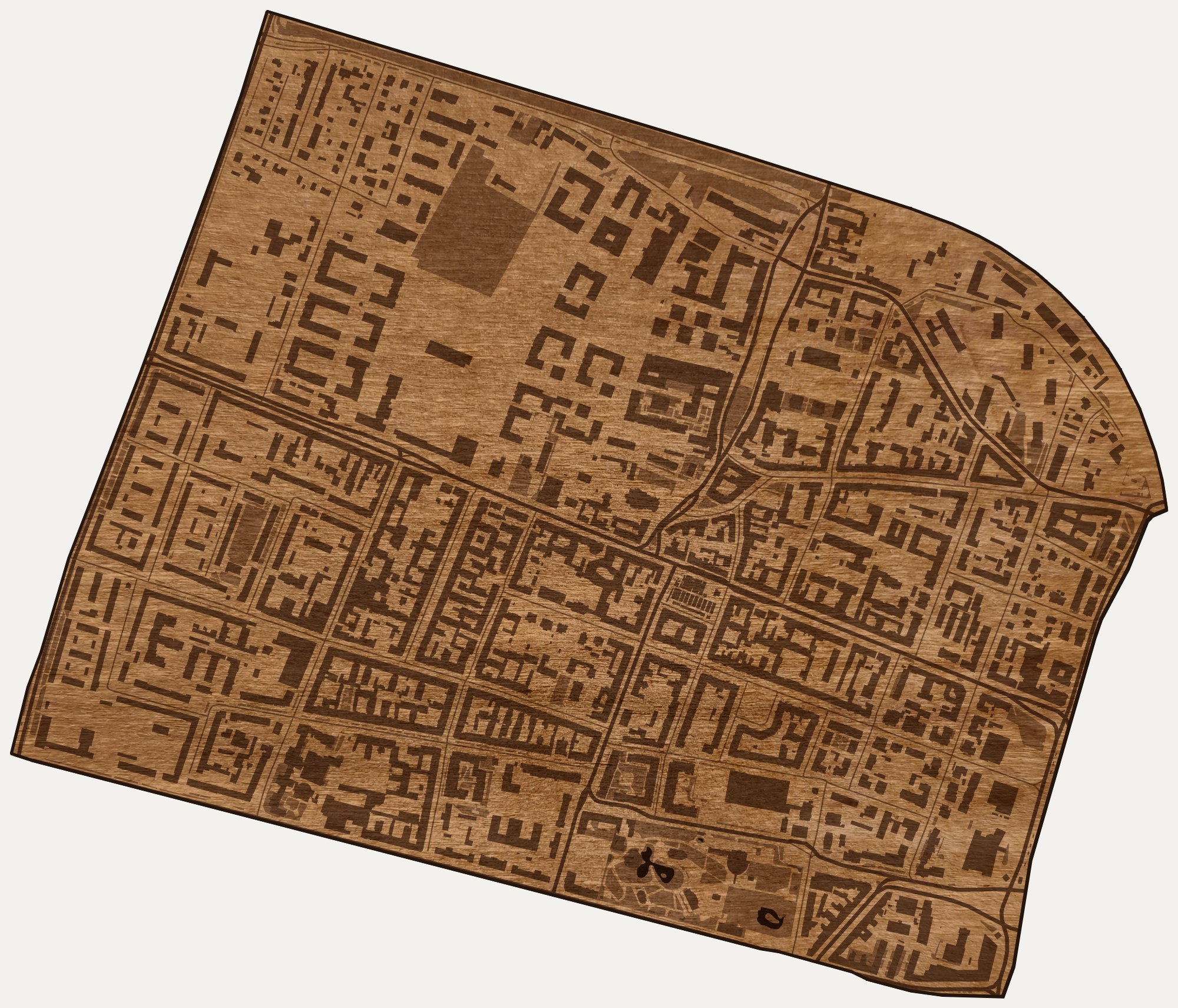 Drewniana mapa dzielnicy Jeżyce (Poznań) na ścianę z jednego kawałka, granice osiedli wygrawerowane