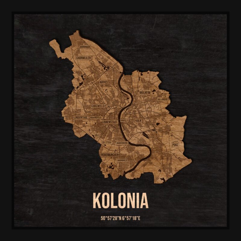 Drewniana mapa Kolonii w ramce 25×25: kontur miasta na czarnej płycie, ulice, zabudowa, rzeki, granice i nazwy dzielnic