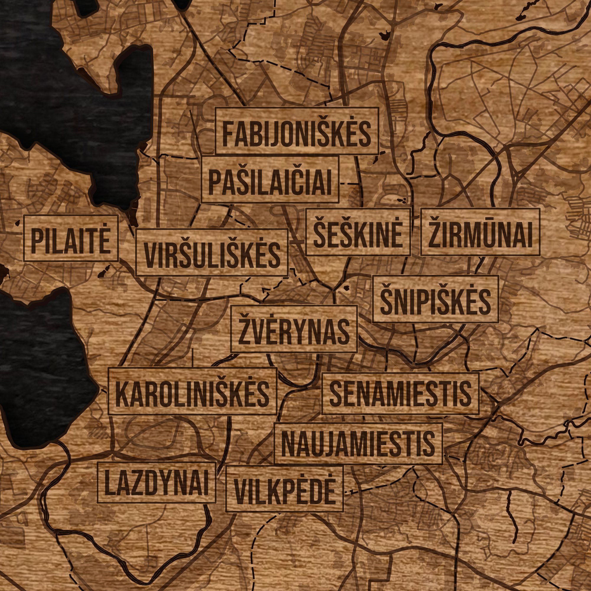 Zbliżenie drewnianej mapy Wilna: grawer ulic, zabudowy, wody, granic i nazw dzielnic