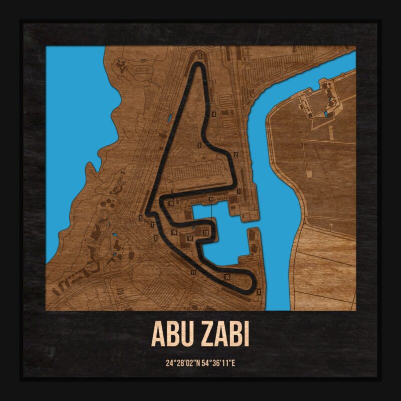 Tor Abu Zabi w ramce 25×25: drewniana mapa toru z podpisanymi zakrętami